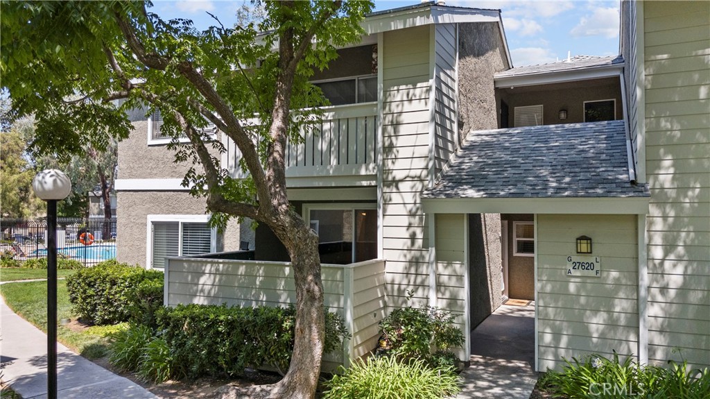 This stylish ground-floor corner unit is a rare find—1 bedroom, 1 bath, and 700 sq ft of updated comfort. The open layout features gorgeous ceramic wood-look tile flooring, quartz countertops, a sleek newer backsplash, and a recently upgraded sliding glass door that opens to a private outdoor space. You’ll love the convenience of two parking spots (one covered with storage) and easy access to the community pool—perfect for relaxing weekends. Located in an FHA/VA approved complex, this home offers an ideal blend of modern upgrades and low-maintenance living. A perfect opportunity for first-time homebuyers or downsizers.