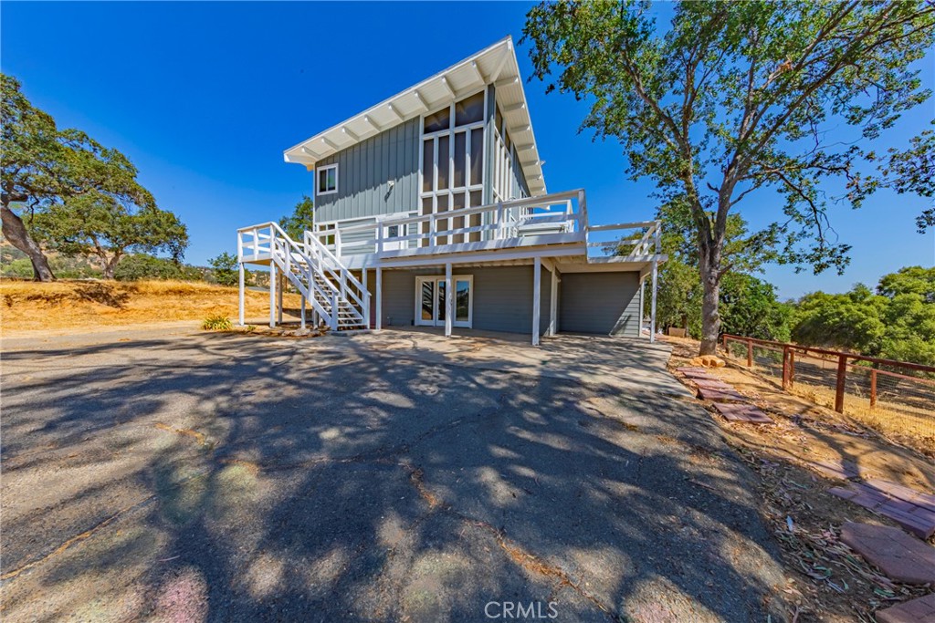 Modern Mountain Retreat in Yosemite Lakes Park – 5 Bed, 3 Bath, Stunning Views!
Welcome to this beautifully updated 3-story home featuring 5 bedrooms and 3 baths, perfectly situated in the desirable Yosemite Lakes Park community. Designed to capture the beauty of its surroundings, this home boasts amazing floor-to-ceiling windows that flood the space with natural light and frame breathtaking views from every level.
The first level includes a private living area with a bar, space for a kitchenette, one bedroom, and a full bath—ideal for guests or multi-generational living. The second (main) level showcases a spacious living room with access to a large wraparound deck, a bright kitchen, dining area, two bedrooms, and another full bath. The third floor is a private retreat, featuring the main bedroom with ensuite bath, its own deck, and an additional bedroom perfect for an office or creative space.
Enjoy peace of mind with a newer roof and siding (approx. 6 years old), as well as updated carpet and fresh paint throughout. With so many upgrades, this fabulous home offers comfort, style, and functionality.
Located just a short drive from Yosemite National Park and Bass Lake, and within a subdivision that includes golf, tennis, pool, park, clubhouse, and two restaurants—this is mountain living at its best.
Call today to view this one-of-a-kind home and experience everything it has to offer!