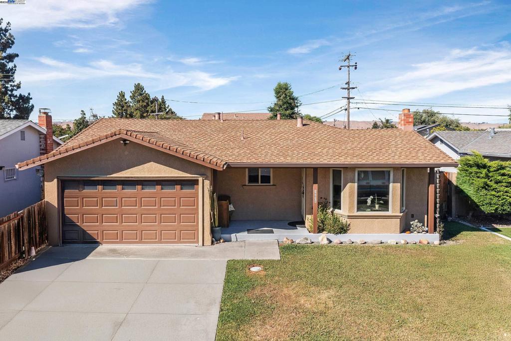 This meticulously upgraded Sundale residence in Fremont blends modern comfort with effortless living. The home features a chef’s kitchen with a 2024 Thor dual-fuel range, remodeled bathrooms with new luxury vinyl flooring, and a refreshed family room with stylish new flooring - all enhanced by fresh interior paint (completed July 2025). The inviting layout includes a sunlit front room with a bay window and vintage fireplace, plus an entertainment-ready space pre-wired for surround sound. Premium upgrades include a 50-year presidential roof, energy-efficient dual-pane windows, whole-house copper repiping, a 400-amp electrical panel, and 2024 exterior paint. Step outside to a serene, low-maintenance retreat - a vast 2,100+ sq. ft stamped concrete backyard with a lush succulent garden, vegetable beds, and an intricate drip irrigation system for easy care. The property also features two fenced side yards and a standout detached 18x20 workshop (200-amp power, air piping, insulation) with ADU potential - perfect as a gym, maker space, home office, studio, or creative space (buyer to verify permitted uses). Ideally located near shopping and transit, this turnkey home offers both luxury and practicality.
