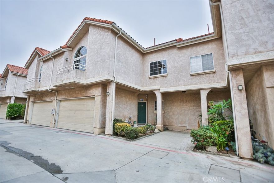 Located in a quiet gated community, this updated 3-bedroom, 2.5-bathroom home offers a comfortable layout with thoughtful upgrades throughout. Enjoy new flooring across the entire home, plus a remodeled kitchen featuring modern appliances and finishes. The main floor includes a half bathroom for guests. Upstairs, all bedrooms are generously sized. The primary suite features a walk-in closet, a private balcony, and a fully remodeled bathroom. The second full bathroom has also been updated. On the third level, you'll find a private rooftop patio. Other highlights include an attached 2-car garage and HOA coverage for trash, water, and front yard maintenance. This move-in-ready home combines everyday functionality with upgraded touches in a well-maintained community.