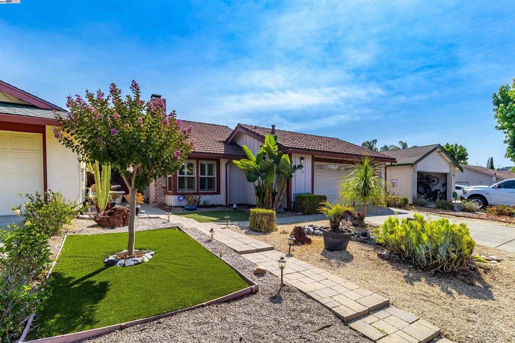 Welcome to 943 Coral Ridge Circle in the highly desirable Viewpointe neighborhood! On a typical morning, you’ll find neighbors walking their dogs, children playing, and a warm sense of community in the air. Right outside your front door are beautifully maintained walking trails and parks, perfect for morning strolls. Conveniently located just off Highway 80, this home offers easy access to shopping, dining, and everyday conveniences. Inside, the spacious layout features 3 bedrooms, a versatile bonus family room, and 2 updated bathrooms. The back and front yards have been recently upgraded and feature low-maintenance landscaping. Interior highlights include neutral-toned laminate flooring, stone kitchen counter tops, wood cabinetry, along with a peninsula that seats three. The family room boasts vaulted ceilings, a wood burning fireplace, and sliding patio doors that lead to the sun porch, perfect for relaxing, entertaining, or gardening. The primary bedroom offers a private en-suite bathroom and a sliding door that opens to the meticulously maintained backyard perfect for entertaining, complete with fruit trees, artificial turf, and a shed. Don’t miss this opportunity to own a home in one of Rodeo’s most sought-after communities!