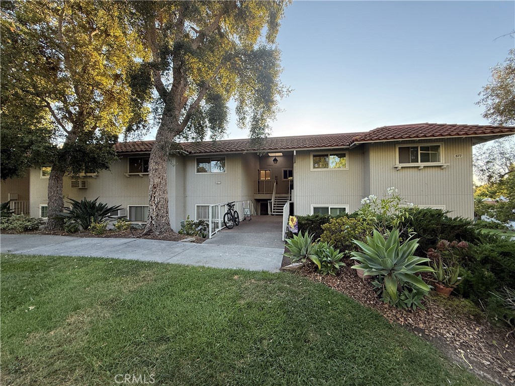 Welcome to your new home! This beautifully located upper-level Castilla model offers 2 bedrooms and 2 bathrooms in the highly desirable Knob Hill section of the 55+ Laguna Woods Village. Enjoy the peace and tranquility of this scenic, quiet setting. The spacious balcony is the perfect spot to savor your morning coffee or unwind with an evening drink while taking in the lush, natural views. You’ll have a dedicated carport space with additional storage cabinets, along with plenty of guest parking. The kitchen is equipped with a refrigerator, dishwasher, and cooktop range. A stackable washer and dryer are conveniently located in the primary bathroom. Laguna Woods Village is a premier 55+ community offering resort-style amenities, including a 27-hole championship golf course (for residents and guests only), a 9-hole par-3 course, pickleball, tennis, lawn bowling, two fitness centers, seven clubhouses, and five swimming pools. Additional features include an equestrian center, gardening plots, an art studio, a world-class woodshop, and more than 250 social clubs and organizations. Residents also enjoy free bus transportation within the community and to nearby shopping centers, along with RV and boat storage options. All this is just six miles from the world-famous beaches of Laguna Beach. Portable air conditioner included without warranty. See 3D Tour. Carport: 498-11