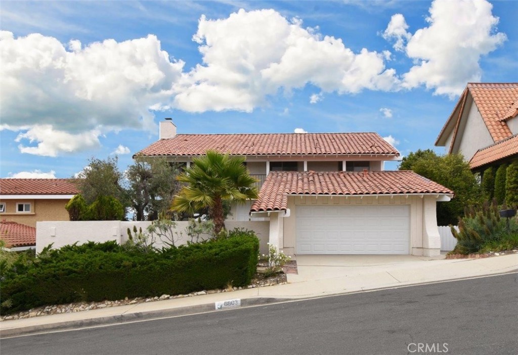 Live the life in this spacious ocean-view home in the heart of Rancho Palos Verdes. Located within the award-winning Palos Verdes Peninsula Unified School District. Step past a private front yard into a spacious entryway that flows into an expansive living room with dramatic ocean views. A cozy fireplace and a sliding glass door to the backyard make it perfect for both entertaining and quiet evenings. The main floor features a flexible den—ideal as a home office, playroom, or easily converted into a main-level bedroom. The sunlit kitchen offers views of the Pacific and Catalina Island, and the adjoining breakfast nook and formal dining room bring beauty to every mealtime. Upstairs, the oversized primary suite boasts dual closets, en suite bath, and panoramic ocean views. A second ocean-facing bedroom joins three more generously sized rooms—two with balcony access—plus two full baths and a powder room downstairs. Tastefully updated over the years, it includes a newer forced air unit, water heater, dishwasher, garbage disposal, and interior paint—offering both comfort and peace of mind Enjoy being close to parks, golf courses, hiking trails, shops, and restaurants, this home blends lifestyle and location with easy on and off the Peninsula.