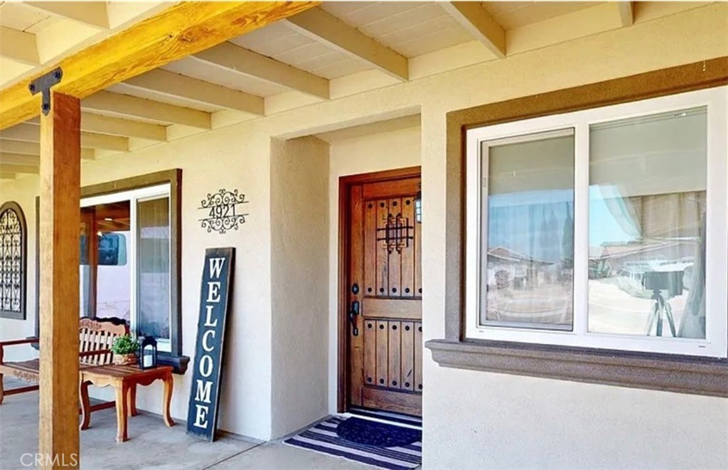 Experience the perfect blend of country charm and modern living in this beautifully updated 3-bedroom, 2-bathroom home located in the highly sought-after Norco Bluffs neighborhood. This turnkey property offers panoramic mountain views, spacious outdoor living, and rare development potential—ideal for homeowners and investors alike.
Step inside to find a warm, inviting floor plan featuring recessed lighting, a smart thermostat, crown molding throughout, wood flooring, upgraded baseboards and casing throughout, and a host of major upgrades including a newer roof, upgraded water heater, newer quiet cool fan in attic, and an electrical panel prepped for solar—an excellent step toward energy efficiency. Fresh interior and exterior paint gives the entire home a crisp, modern appeal.
Outside, the possibilities are endless. The expansive lot is fully fenced with durable vinyl fencing, and the property includes new rain gutters, a brand-new front yard drip irrigation system, new valves, and low-voltage landscape lighting for added beauty and function. The grounds are enhanced by fruit-bearing trees, including sweet oranges, tangy lemons, and a rare pomelo tree, perfect for those who appreciate homegrown goodness.
Equestrian lovers will appreciate the classic barn, offering authentic country living and flexible space for animals, hobbies, or storage. There’s ample room for RVs, boats, or trailers, making it ideal for those who love to live big.
What truly sets this property apart is its development potential. With ample space, this lot is ready for an ADU (Accessory Dwelling Unit)—perfect for multigenerational living, rental income, or increasing long-term property value. Located in a top-rated school district, this opportunity is ideal for both growing families and savvy investors.
Whether you're watching sunsets over the mountains, caring for animals, or enjoying fresh citrus from your backyard, this gem offers a unique lifestyle that blends rural tranquility with modern convenience. Don’t miss your chance to own this rare gem in one of Norco’s most desirable communities.