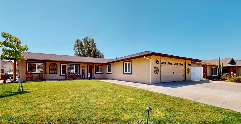Welcome to this beautiful turnkey 3-bedroom, 2-bathroom equestrian property nestled in the highly sought-after Norco Bluffs neighborhood. Set on a spacious lot with incredible panoramic views of the mountains, this home combines modern upgrades with timeless charm and offers the perfect blend of comfort, functionality, and country living.
Step inside to discover an inviting floor plan enhanced by recessed lighting throughout the house and a smart thermostat for year-round comfort. The home boasts major upgrades including a newer roof, upgraded water heater, and an electrical panel prepped and ready for solar installation—a great option for energy efficiency. Fresh new interior and exterior paint gives the home a crisp, updated look throughout.
Outside, the property truly shines. A classic barn adds authentic equestrian appeal, making this home ideal for horse enthusiasts or those seeking extra space for hobbies and storage. The fully fenced yard features a durable vinyl fence, newly installed rain gutters, and brand-new irrigation systems in both the front and back yards—with new valves and a new drip irrigation system in the front yard for added convenience. New low-voltage lighting further enhances the landscaping, adding charm and visibility for evening enjoyment. There’s even room to bring your RV or boat—plenty of parking space makes it easy to accommodate all your toys and trailers.
Enjoy the bounty of nature with your own fruit trees, including sweet oranges, zesty lemons, and a rare pomelo tree—perfect for homegrown treats.
Whether you're relaxing on the patio watching the beautiful mountain view, caring for animals, or enjoying fresh citrus from your garden, this Norco gem offers the tranquility of rural life with modern-day conveniences. Don’t miss your chance to own a slice of horse country in one of Norco’s most desirable communities!