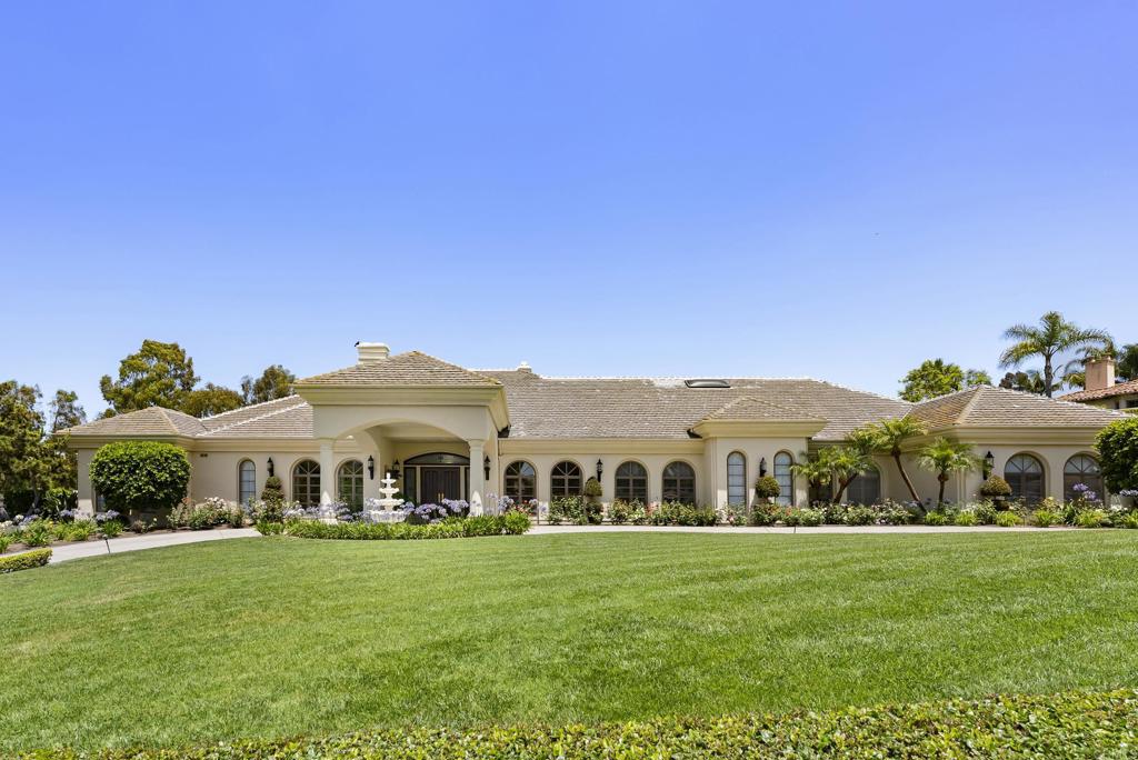 17124 Circa Oriente is an exquisitely upgraded single-level estate nestled within the prestigious guard-gated community of Fairbanks Ranch in Rancho Santa Fe. Recently renovated with meticulous attention to detail, this exceptional luxury property features new wood flooring, stunning new gourmet kitchen, new HVAC systems, updated electrical and plumbing, elegantly blending timeless charm with modern amenities. The heart of the home showcases a beautifully redesigned gourmet kitchen connected to a sophisticated family room complete with a custom bar and cozy fireplace. Designer-selected details throughout the residence beautifully enhance its seamless indoor-outdoor flow and impressive scale, creating a captivating experience from the moment you enter. The estate’s expansive grounds provide an idyllic setting for both entertaining and private relaxation. Enjoy breathtaking sunset views from the western-facing porte-cochère or savor tranquil vistas of the Rancho Santa Fe hills from the primary suite's private patio. Premium on-site amenities include a pristine pool, professional tennis court, gym, a private sauna and a pool house with bathroom and kitchen creating an unparalleled resort-style living experience. Residents of Fairbanks Ranch enjoy access to exceptional community amenities such as four lighted tennis courts, four lighted pickleball courts, basketball and volleyball courts, equestrian facilities with picturesque trails, serene lakes ideal for paddle boating and fishing, and a community clubhouse hosting regular social events. Families will appreciate the well-equipped playgrounds and picnic areas, all secured by 24-hour guarded patrol. Discover unmatched luxury and elegance at 17124 Circa Oriente, where sophistication, comfort, and exclusivity come together in one of Rancho Santa Fe’s most coveted communities.