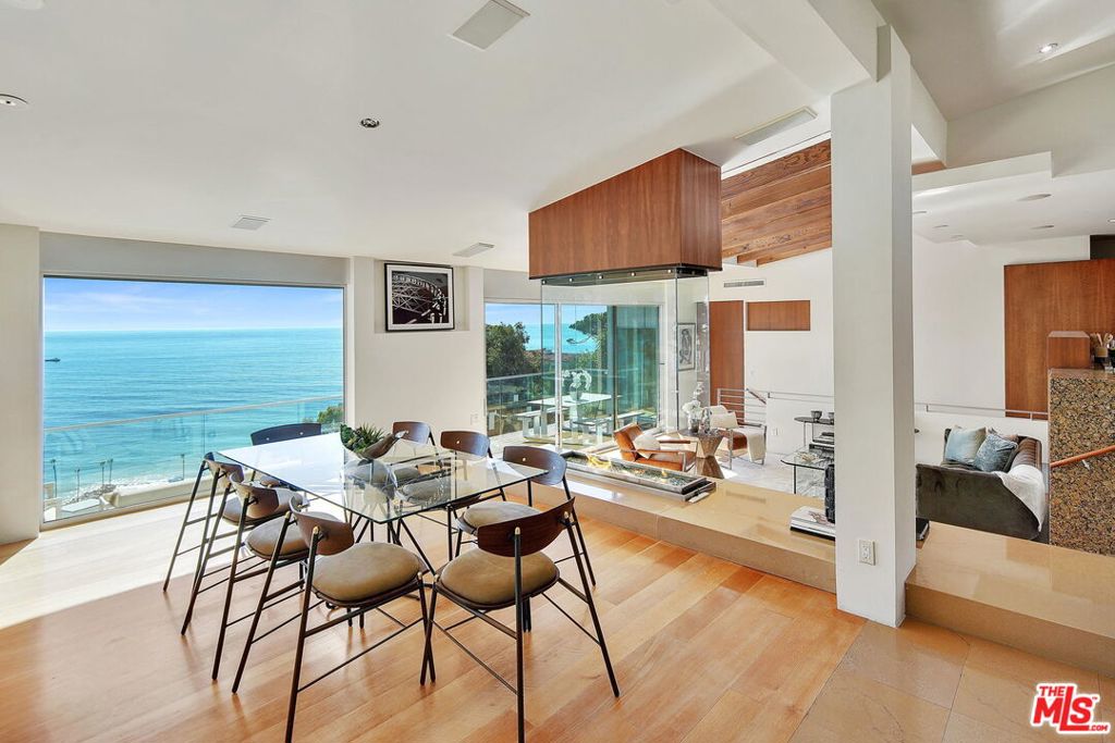 Nestled on a quiet cul-de-sac in the sought-after Castellamare bluffs of Pacific Palisades, this beautifully remodeled home offers an ideal blend of coastal charm and modern design. The open-concept floor plan features expansive sliding doors that lead to multiple balconies, creating seamless indoor-outdoor living and capturing panoramic ocean vistas. Whether you're relaxing inside or enjoying the fresh ocean breeze outside, you'll feel like you're on a year-round vacation. Located just minutes from the beach and scenic hiking trails.