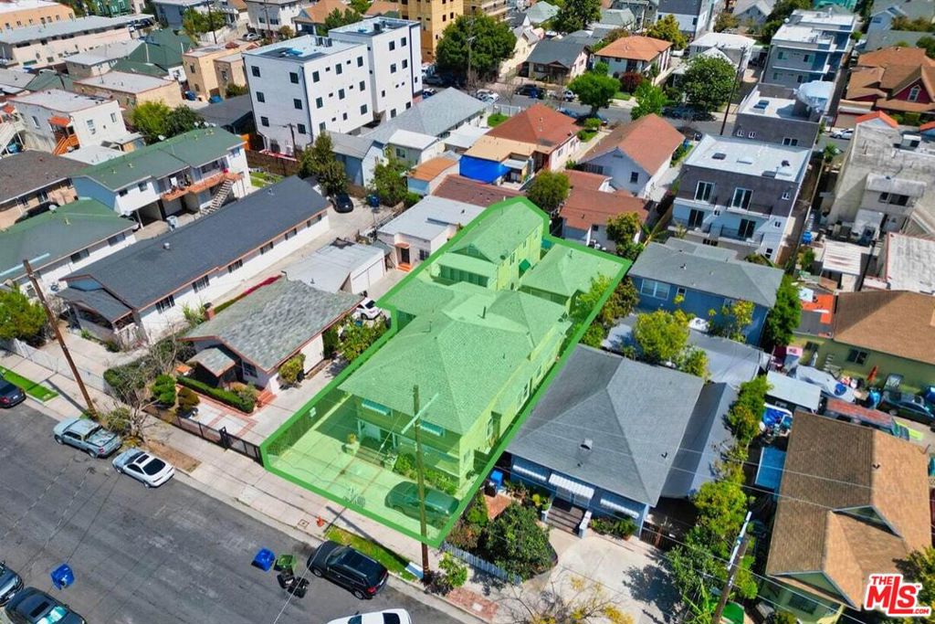 Compass is pleased to present the opportunity to acquire a four-unit apartment building in the Olympic Park-Koreatown neighborhood of Los Angeles. This property boasts a diverse unit mix, featuring 2 three-bedroom and two-bathroom units, 1 two-bedroom and two-bathroom unit, and 1 one-bedroom and one-bathroom unit. Gas and electricity are independently metered, while water is centrally metered. The construction combines stucco and wood-frame elements and offers 5 parking spaces for on-site tenants. Given that rents are currently below market value and the area is undergoing continued gentrification, investors will recognize the value in seizing this opportunity.