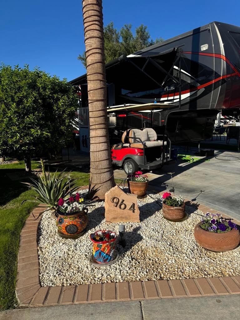 GOLF COURSE LOT 964This property features an excellent location and an even more appealing price. Private location. On hole #5 of the back nine golf course and near satellite E, residents can enjoy amenities like the pool, spa, restrooms, and laundry. This listing includes several extras with the propertyBBQ, 2 stationary umbrellas, Small patio table with 4 chairs, Large Patio table with 5 chairs, pati seating love seat , 2 arm chairs and coffee table, 2 propane heaters with propane tanks, Little Chief smoker, small beer fridge , water softener, miscellaneous totes and supplies.*Golf cart for sale separately at $3,500.*RV excludedHurry and make your offer now as this is one of the lowest priced golf course