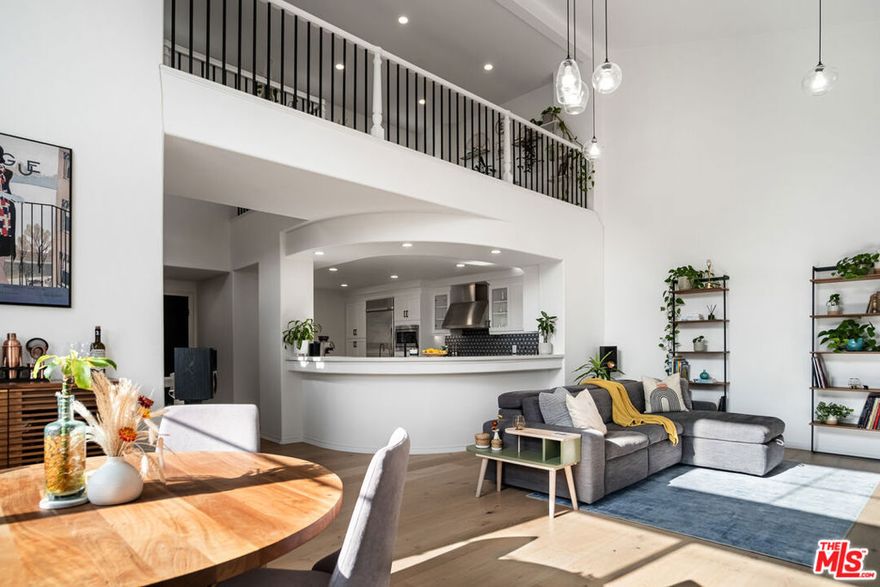 Welcome to Unit 425, "The Great Retreat," a truly exceptional top-floor home in Playa Vista. This residence stands out among the community's thousands of units due to its premium location, unique floor plan with minimal shared walls, and high-end renovation. This home was recently renovated with the love and care of a homeowner, not a flipper, featuring nearly $150,000 in upgrades. No detail was overlooked, from the premium White Oak engineered wood floors and beautifully updated kitchen and bathrooms to custom, remote-controlled window treatments and hand-blown pendant lights. The residence is also fully equipped with smart technology, including a smart lighting system to customize the ambiance, a Nest thermostat, KwikSet door lock, and a Ring doorbell with speakers on all floors. Unlike many condos that share 60% of their walls with a neighbor, this unit shares only about 10%. Fewer shared walls means more sunlight, greater privacy, and less noise. As a top-floor unit, it benefits from uniquely high ceilings, creating an airy, sunlit space. The southern-facing direction ensures abundant natural light floods the home throughout the day. Located in the desirable Serenade building, this is one of the most walk-friendly addresses in Playa Vista. You are literally steps away from Concert Park and the community's most charming commercial district: a summer concert, a beer, or a cup of coffee is just a few steps away. The Serenade complex itself is an oasis, boasting Mediterranean and Tuscan-style architecture. With lush gardens, multiple water fountains, and airy corridors, the complex feels like a vacation getaway. Importantly, this is also one of Playa Vista's best-maintained and financially healthiest buildings, with a funded reserve of nearly 80%. Unit 425 is truly your retreat: offering the best location, high-end finishes, and a rare sense of peace and quiet. Other Notes: The 3rd bedroom is a loft. In-unit laundry, 2-car tandem parking, central heating and cooling, shared electric car charger. Tax records state 1,740 sqft.