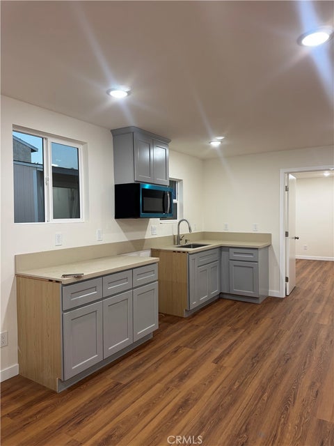 Photo of 5567 Olive AVE, Long Beach, CA 90805 (MLS # DW26180854)