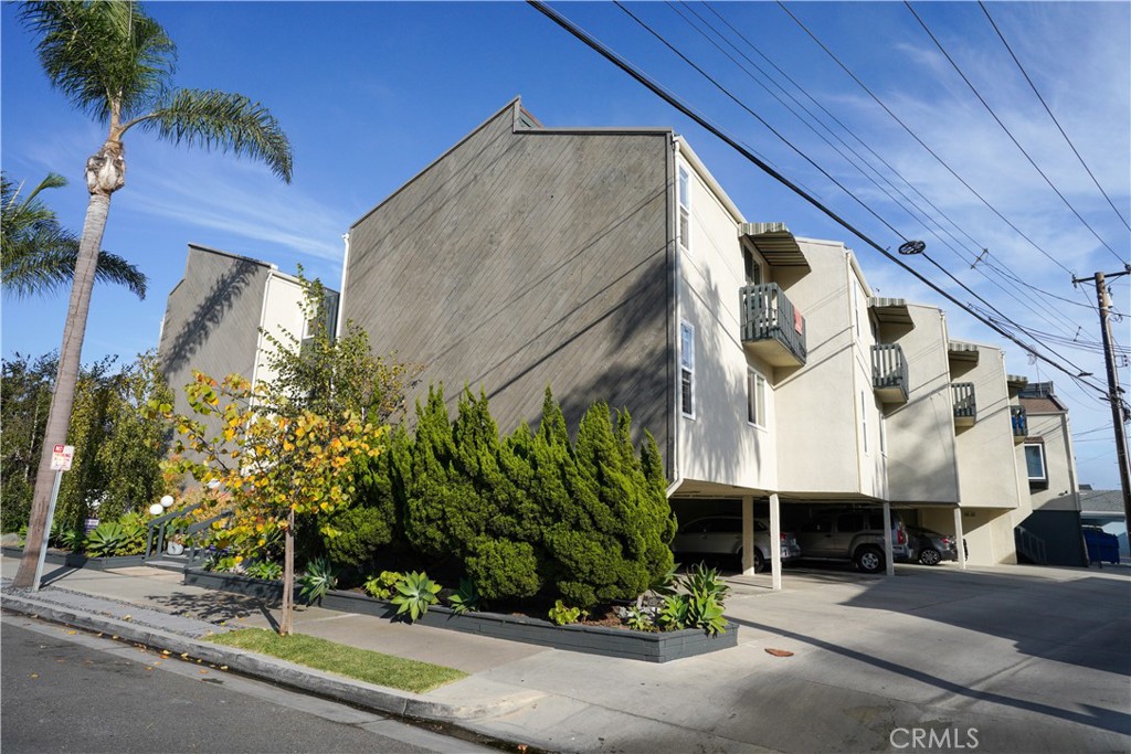 Nestled in a serene and beautifully landscaped enclave, this charming townhouse offers the perfect blend of tranquility and convenience, just moments away from the Pavilions Shopping Center, Main Street, and the sun-lit shore of Seal Beach. Inside, the there are two expansive bedrooms that create an inviting atmosphere for relaxation and creativity. The upgraded bathroom sparkles with modern elegance, while the cathedral ceiling and ceiling fans enhance the sense of space and comfort. Cook up culinary delights in the well-appointed kitchen, complete with a stove, microwave, and refrigerator, and enjoy meals in the dining area framed by graceful, flowing cabinets and an elegant wet bar. Sunlight dances through the various windows, filling the home with natural light and refreshing beach breezes. With a shared laundry room and convenient onsite carport, this townhouse seamlessly combines modern amenities with the idyllic coastal lifestyle you've been dreaming of.
