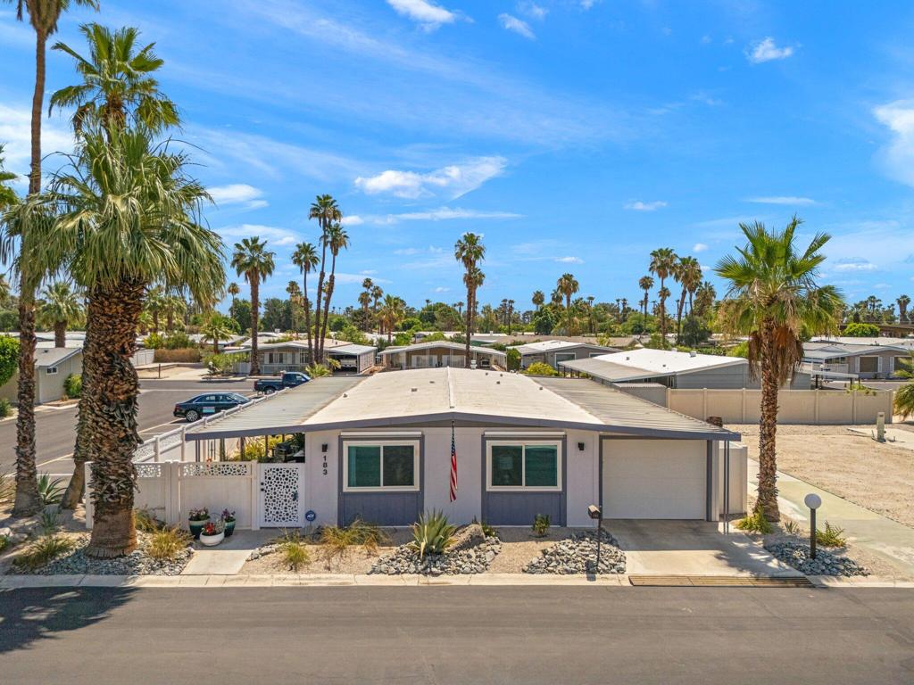 Welcome to El Dorado Palms Estates, a charming 55-plus community nestled in Palm Springs where you OWN THE LAND. This beautifully maintained home is situated on a desirable corner lot, offering stunning mountain views and serene outdoor living spaces--perfect for relaxing or entertaining. This property has been extensively upgraded with attention to style and sophistication, ensuring a comfortable and modern lifestyle. Inside, you'll find new flooring, baseboards, and trim throughout. The kitchen boasts newer cabinets, countertops, fixtures, and appliances, complemented by a spacious island that provides additional storage and functionality. The bathrooms feature modern vanities, counters, fixtures, and toilets, with the primary bathroom including a linen closet. Custom tile surrounds and glass doors in the showers add a touch of elegance. Customized closet systems maximize storage. Additional interior upgrades include upgraded electrical wiring with CAT5 cabling, copper plumbing, new lighting and ceiling fans, drywall throughout, and solid wood interior doors. Energy efficiency has been prioritized with a foam roof, tankless water heater, vinyl doors and windows, and replaced exterior doors. For comfort and convenience, the home is equipped withhoneycomb blinds on the interior. The exterior features electric shades on east/west windows and manual shades on the south. The exterior features a custom vinyl fence around the perimeter, a security gate, enclosed parking space for two vehicles, complete with a garage door and opener. The low-maintenance desert landscaping, upgraded irrigation system, security lighting, and recent exterior repaint enhance curb appeal and functionality. The yard also includes two storage areas. Some furnishings are available to make your move-in even easier. The community offers fantastic amenities, including an on-site manager, fitness center, pools, spas, saunas, an event space with stage, tennis and pickleball courts, and a charming library--plus the added benefit of owning the land. Don't miss this exceptional opportunity to enjoy affordable, stylish living in a vibrant community with breathtaking mountain views. Contact us today to schedule a private tour!