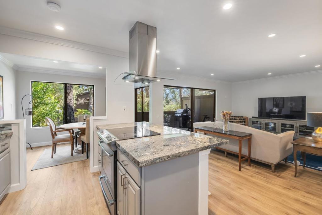 Thoughtfully designed and impeccably renovated, this 2BR/2BA condo offers a Tahoe-inspired lifestyle with resort-caliber amenities just moments from downtown San Carlos. Elegant crown moldings, new wide-plank flooring, and a soft designer color palette enrich the light-filled interior, setting a sophisticated tone throughout the open-concept plan. Walls of glass invite nature in and reveal a private, oversized patio that seamlessly expands the living and dining spaces. The kitchen features stone countertops, custom cabinetry, stainless steel appliances, and a generous breakfast bar. Tucked away for privacy, the serene primary suite boasts an expansive, custom-crafted closet and a luxurious bathroom. Completing the interior are a laundry room, a full bathroom, and a well-proportioned second bedroom thats ideal for guests or a home office. Amenities include access to a clubhouse, a children's play area, four swimming pools, and two tennis courts. Zoned for top-rated schools, offering effortless access to major commute routes, and walkable to the picturesque hiking trails of Edgewood Park. Experience the rare blend of natural beauty, convenience, and refined living.