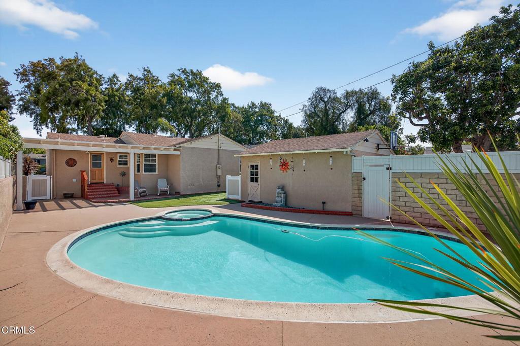 The door is open, and you are welcome at 2418 Lexington Drive, a beautifully maintained and lovingly modernized 3-bedroom, 2-bathroom single-family home located in Ventura's desirable Cunnane Tract. This charming residence offers the perfect blend of classic style and contemporary comfort, all within a vibrant and historic Ventura neighborhood named after beloved Dr. Thomas E. Cunnane, who began his practice in the community in 1899.Enjoy the benefits of a home meticulously cared for and updated by the same family for 45 years. It's Move-In Ready! The freshly painted interior makes this a turnkey purchase, ready for immediate enjoyment. If you are looking for an Oasis, step into a private, beautifully fenced backyard featuring a sparkling Swimming Pool and Jacuzzi - perfect for relaxation and entertaining.The heart of the home, the kitchen and bathrooms, have been stylishly redesigned and upgraded for a modern aesthetic and functional living. Experience enhanced comfort and efficiency with Milgard windows, modern forced-air heating, water conditioning, and tankless water heating.This custom home is nestled on a wide, tree-lined street, offering a picturesque and tranquil setting. Enjoy close proximity to Ventura's hospitals, shopping centers, and schools. Ventura's beach and harbor are less than a ten-minute drive away, allowing you to enjoy the best of California coastal lifestyle.2418 Lexington Drive is more than just a house; it's a place to create lasting memories. Don't miss this opportunity to own a piece of Ventura's charm and enjoy the exceptional lifestyle this home and location have to offer.