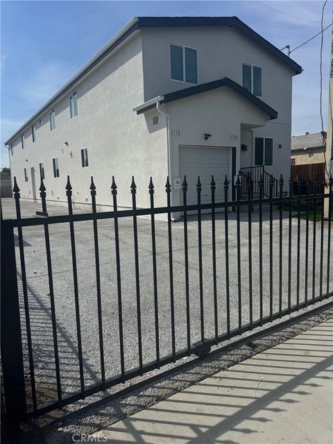 Photo of 1510 E 108th St, Los Angeles, CA 90059 (MLS # DW26076510)