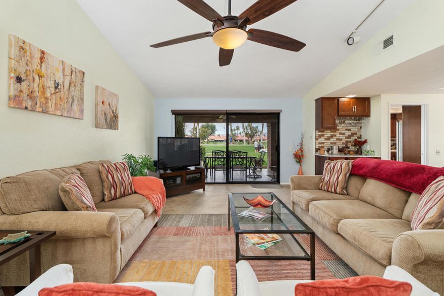 Welcome to your dream retreat! This upgraded 2,051 sq. ft. El Grande model condo offers 3 generous bedrooms and 3 stylish bathrooms, blending comfort with elegance. Soaring ceilings and thoughtfully placed solar tubes fill the home with natural light, creating a bright, open atmosphere.Step out to the tiled patio and take in the serene view of golfers teeing off on a scenic 210-yard par 3. Just a short stroll away, you'll find the sparkling community pool--perfect for sunny afternoons. Inside, a recently updated HVAC system ensures year-round comfort.The kitchen, fully remodeled just 3 years ago, is a chef's delight with modern cabinetry, stainless steel appliances, and a sleek, contemporary design.Enjoy a lifestyle of convenience with the clubhouse just steps away, featuring dining, card games, pickleball, tennis, and a well-equipped fitness center. Chaparral Country Club's prime Palm Desert location puts fine dining, shopping, and entertainment right at your fingertips.From nearly every angle, you'll be captivated by sweeping mountain views--best enjoyed while relaxing on your private patio, listening to the gentle rustle of palm fronds.