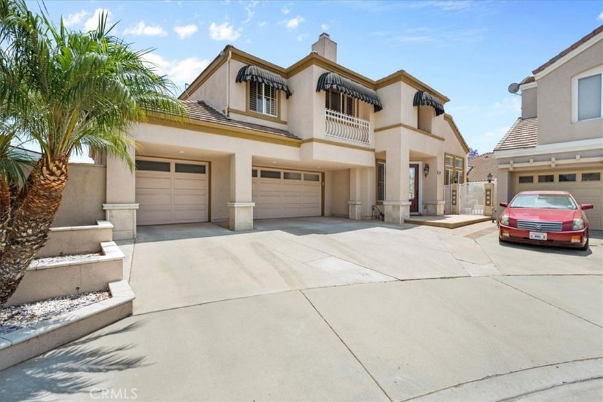 Nestled in the Exclusive Brea Vista Community of Brea, California, this stunning two-story home is a true masterpiece of comfort, luxury, and design. Located at the end of a peaceful cul-de-sac, the home features four bedrooms, three bathrooms, and canyon views. The gourmet eat-in kitchen is a chef’s dream, highlighting custom cabinetry, granite countertops, two ovens (including a convection), both gas and electric cooktops with a designer hood, a trash compactor, built-in refrigerator, and a wine cabinet/cooler. Throughout the home, you will find thoughtful upgrades including recessed lighting, Travertine flooring, high quality Berber carpeting, custom shutters, crown molding, and a custom wrought iron and wood staircase. A dedicated office with rich built-in cabinetry provides the perfect work-from-home space. The custom front add both style and comfort. Step outside to your private oasis featuring a sparkling pool and spa, ideal for relaxing or entertaining. This is luxury California living at its finest.