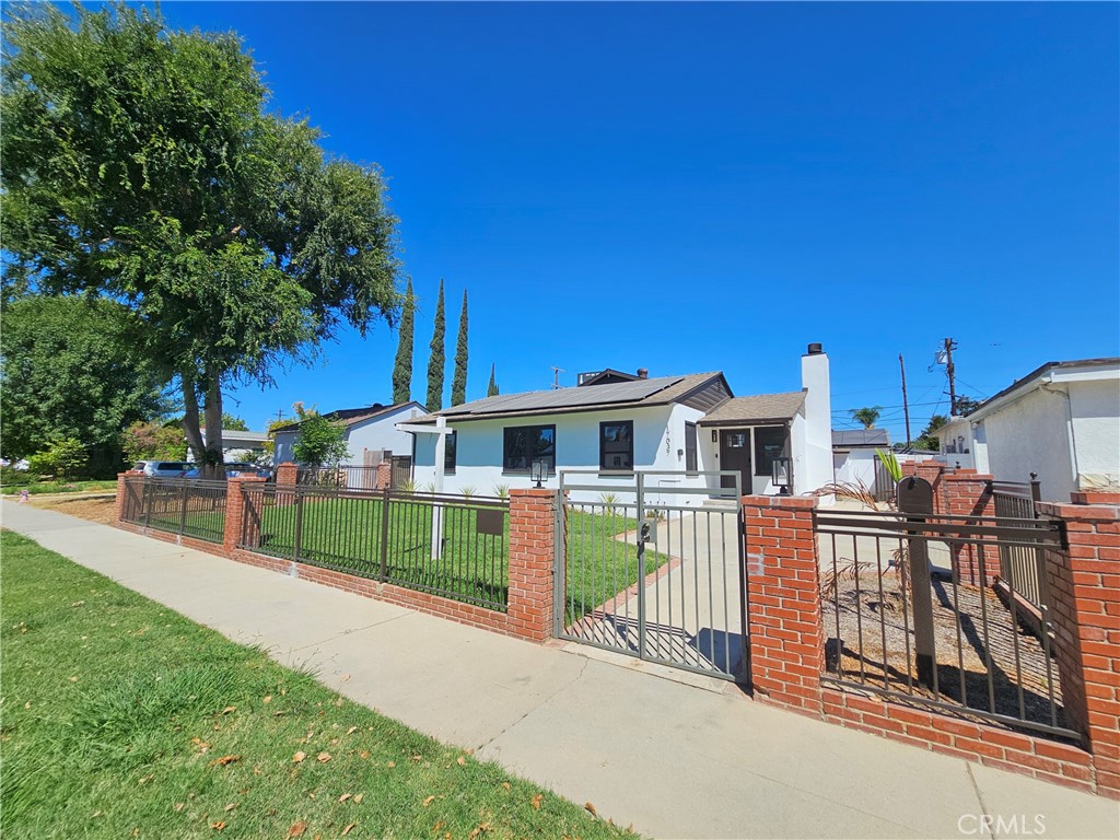 Welcome to this beautiful and fully remodeled from top to bottom, this stunning home. Completely turnkey and ready for move-in. Featuring brand-new everything—including a modern kitchen with quartz countertops and stainless steel appliances, updated bathrooms with designer finishes, new flooring, windows, doors, recessed lighting, and a central A/C system—no detail has been overlooked. The home also includes fully paid-off solar panels, offering long-term energy savings and sustainability. Fresh interior and exterior paint, a spacious backyard perfect for entertaining or potential ADU expansion, and a detached garage add to the home’s appeal. Located in a desirable neighborhood near parks, shops, restaurants, and major freeways, this beautifully upgraded property is a rare find in Van Nuys.