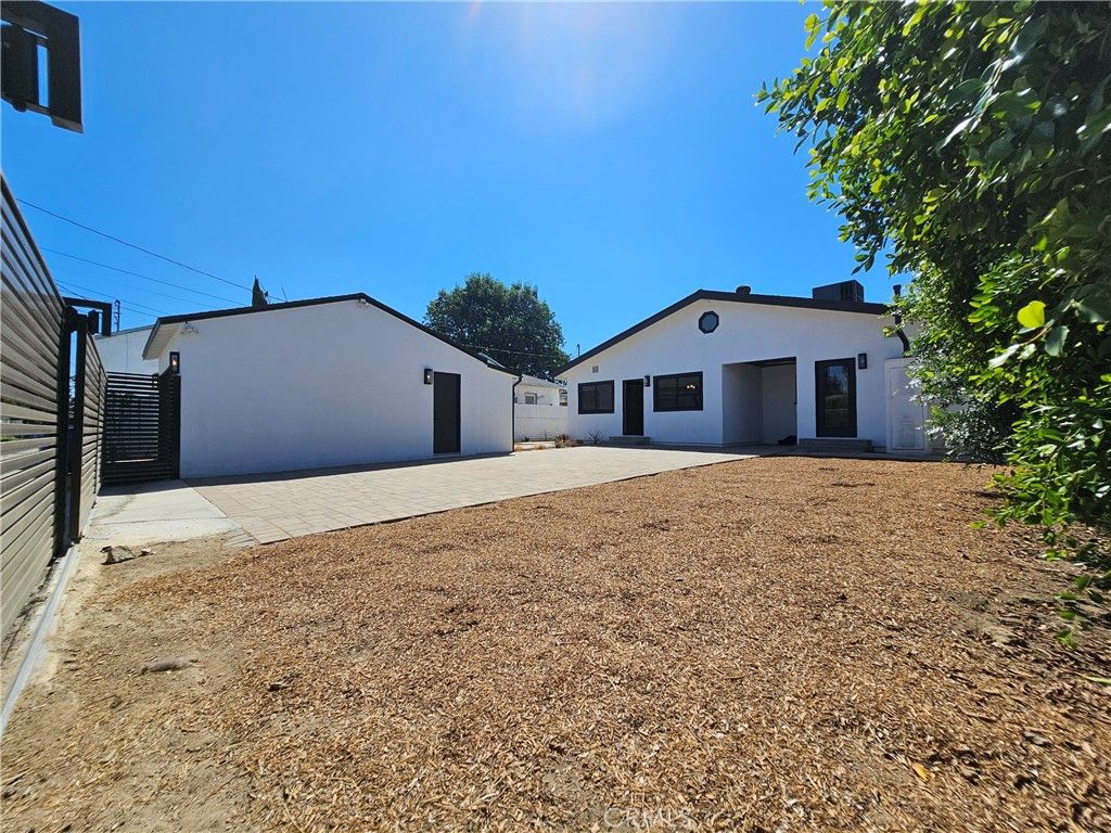 Photo of 17037 Covello Street, Van Nuys, CA 91406 (MLS # DW25198627)