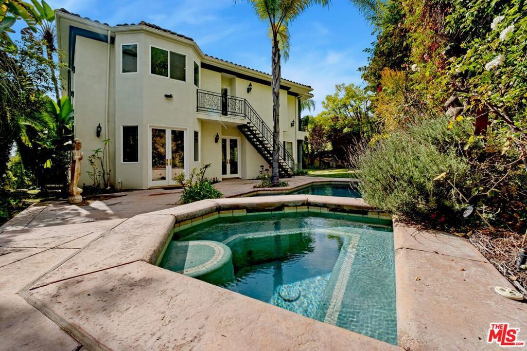 Photo of 2997 Beverly Glen Circle, Los Angeles, CA 90077 (MLS # 25621371)