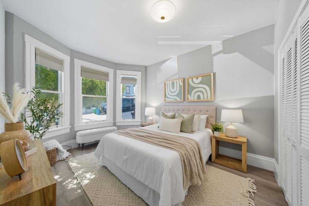 Beautiful & spacious 2 BR condo located in charming & sunny Noe Valley neighborhood! Enjoy a nice view of the city from your deck off the rear of the home as well as a very private common backyard, gardens, & patio area! This home features high ceilings, good lighting, and bay windows. The home has been updated providing a modern feel, but still has original charming details such as the gorgeous wainscoting in the hall. The living room is open to a spacious eat-in kitchen complete with room for an island and a dining table. Kitchen also provides access to the deck & backyard! There is a free common washer/dryer for the residents (only 4 units in the building). Building also has large storage for residents both private storage & common storage area! Property is located close to the upper Noe Recreation Center and Joby's dog run is nearby. A nearby foodie paradise awaits you with wonderful restaurants & local coffee shops! Property is very close to J CHURCH at Church St & Day St stop. Make this beautiful condo and wonderful neighborhood your's today!