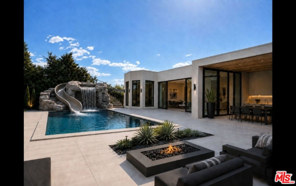 Photo of 16351 Sloan Drive, Los Angeles, CA 90049 (MLS # 26876727)