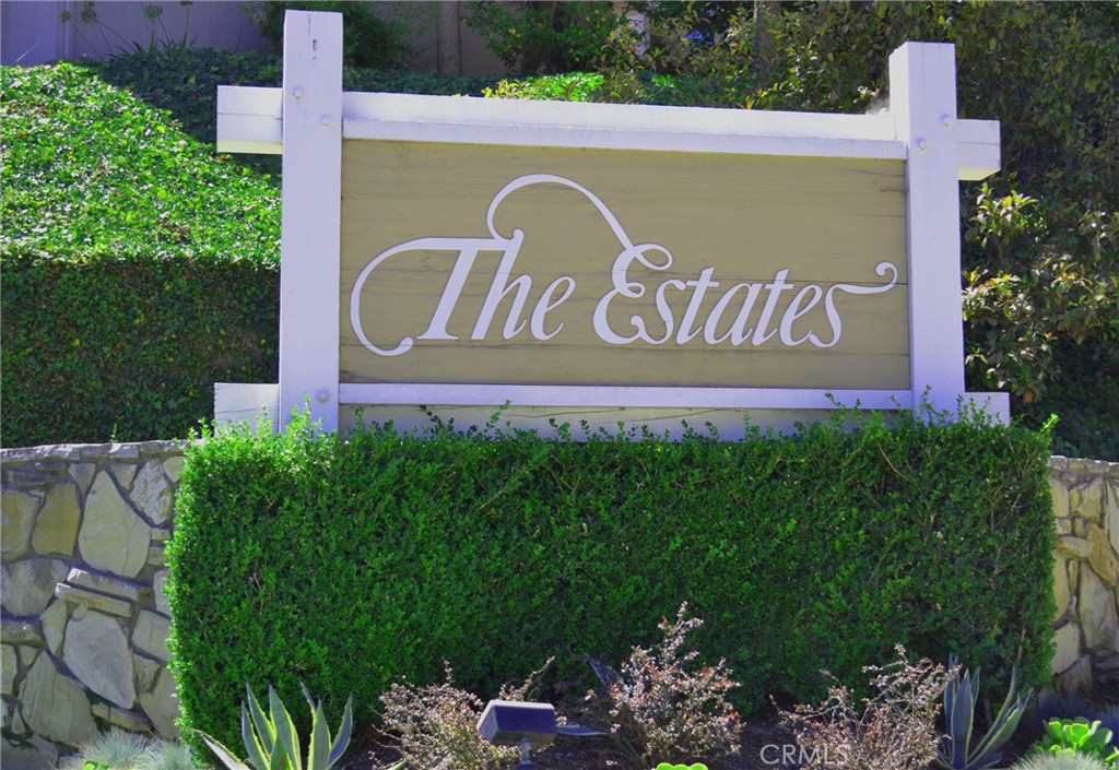 Resort-style living in the Rolling Hills Estates community of THE ESTATES. This single-level condo is nestled in a serene, wooded community with winding pathways surrounded by lush greenery & cascading waterfalls. This one-bedroom condo is nicely upgraded featuring laminate wood flooring, designer paint + & recessed lights. The kitchen features an open bar and built-in appliances including a microwave, new dishwasher. & new stove. The master bedroom features Berber carpeting, recessed lights, ceiling fan, and a large walk-in closet. The living room & bedroom open to a sunny deck area overlooking lush greenery & a gentle stream. The amenities of THE ESTATES community include a large swimming pool with spa, gym, sauna, night lighted tennis courts plus a large club house complete with pool tables, ping-pong tables, fireplace & kitchen area. One secure subterranean parking space (59). Large community laundry area. Located in the heart of the Palos Verdes Peninsula, conveniently close to shopping, restaurants, gyms & parks