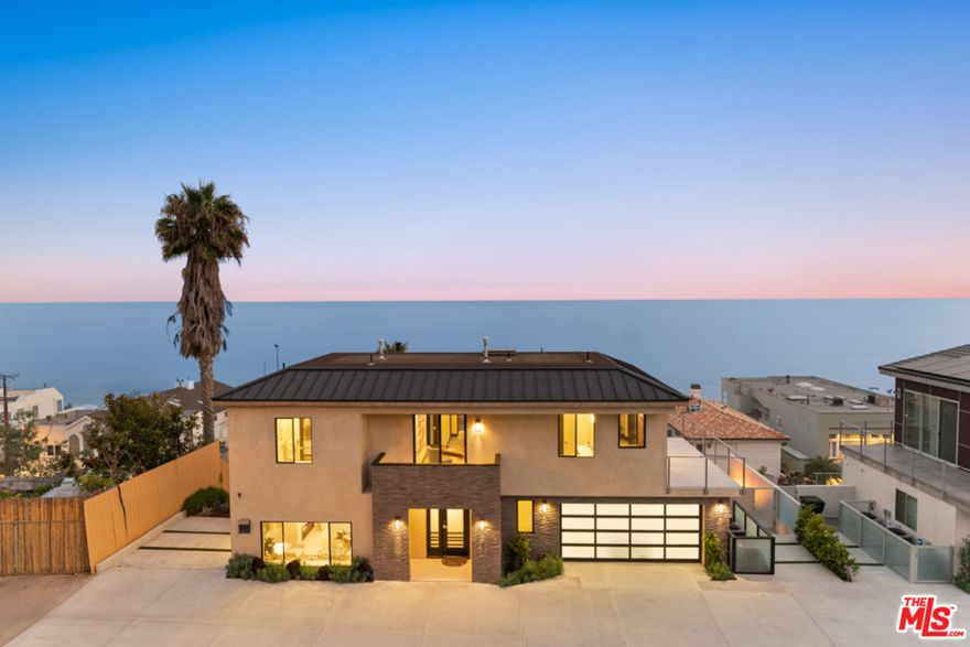 Extensive & costly new construction from the ground up w/180 degree ocean & city light views overlooking  Catalina Island, Palos Verdes, Queen's necklace & Pt. Dume. Truly a one of a kind location that is Malibu's best kept secret on famous Malibu Rd. This home was designed to enjoy the elements of living life at the beach w/beautiful sunrise & sunset views & watching the waves crash. Imagine waking up to some beautiful yachts & boats passing, fish breaking , dolphins playing, paddle boarding  & so much. This 2 story + finished basement on a pvt road includes 3 + loft +3.5, theatre/media rm, commercial grade glass elevator, ocean vu kitchen w/12 ft  wide pocket window, Italian Bertazzoni range,refrig & dishwasher, double lazy susan pull-out's, Quartzite countertops, great rm, fplc, infinity spa w/waterfall & fire pit, built in BBQ, balconies off of ea rm. Good for bathing, yoga,meditation or gazing at the stars. Crestron system,Solar system, plenty of parking, easy beach access