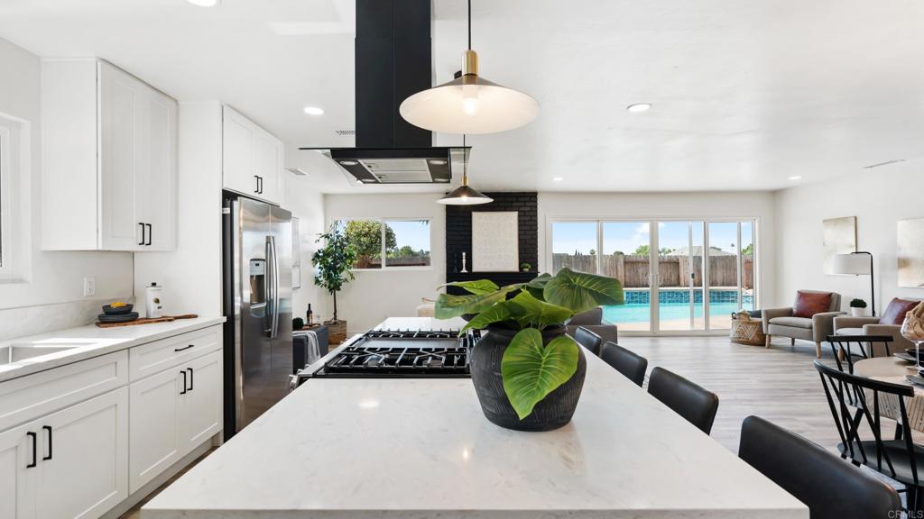 Welcome to this beautifully renovated 3-bedroom, 2-bathroom home in the heart of San Carlos. Step inside to an inviting open-concept layout filled with natural light and modern finishes throughout. The spacious living and dining areas flow seamlessly into a sleek kitchen, perfect for entertaining or everyday living. Enjoy sunny San Diego days in your own private backyard oasis complete with a sparkling pool and space to relax or host guests. Every inch of this home has been thoughtfully updated, offering a turn-key experience in one of the city’s most desirable neighborhoods. Don’t miss your chance to own a move-in-ready pool home in San Carlos!
