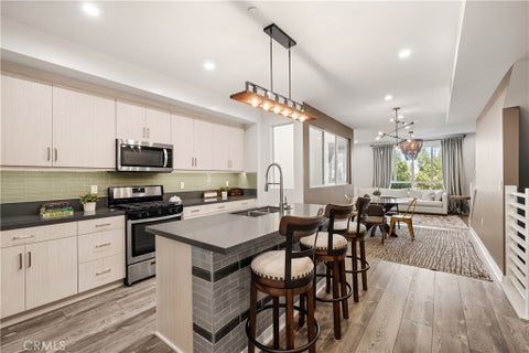 Photo of 14115 W Monroe Place, Van Nuys, CA 91405 (MLS # SR26222826)