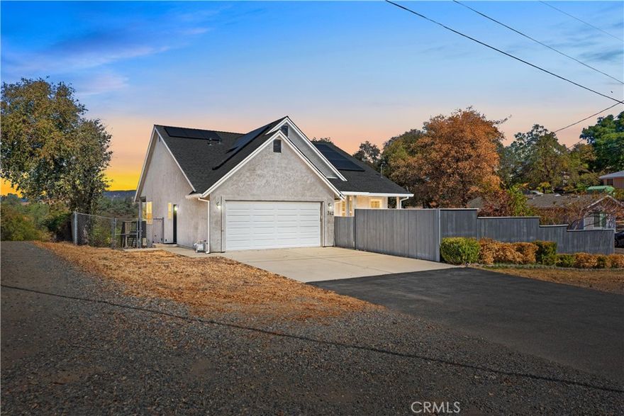 Welcome To This Beautifully Maintained Custom Home Nestled On A Generous Corner Lot In The Peaceful Hills Of Oroville. This 2-Bedroom, 2-Bath Gem Offers A Bright, Open Layout With Plenty Of Space To Relax And Entertain. The Spacious Kitchen Is A Chef’s Dream, Featuring Abundant Cabinet And Counter Space, Plus A Generous Island Perfect For Meal Prep, Gatherings, Or Casual Dining. Start Your Mornings Right—Sip Your Coffee While Taking In Nature’s Beauty From The Large Deck Out Back. Whether You're Enjoying The Sunrise Or Unwinding In The Evening, The Hillside Views Offer A Perfect Backdrop. Additional Highlights Include A 2-Car Garage and OWNED Solar! Plenty Of Outdoor Space, And Serene Surroundings. Don’t Miss Your Chance To Own This Unique And Inviting Home!