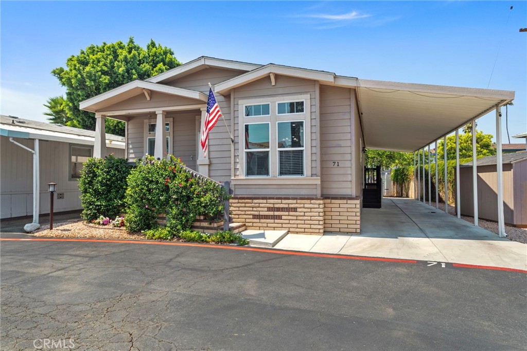 Welcome to Rancho Riverside, featuring a 3 bed 2 bath with 1,512 sqft manufactured home built in 2017, located near the 91 freeway and Magnolia, large rear yard with concrete pad for those summer bbq`s, long covered driveway, corner lot home (1 neighbor), vinyl fencing, USB outlets in kitchen and master bedroom, kitchen features Frigidaire stainless steel appliances, light and bright interior features 9 foot ceilings with 4 ceiling fans, central A/C and recessed lighting and plenty of windows for that natural light, interior has been painted recently, master bedroom features a walk in closet, master bath has a spa bathtub with a new shower head, the community features a club house for gatherings, swimming pool, playground, fitness center and basket ball court, located near shopping centers and dining establishments. don`t miss this opportunity