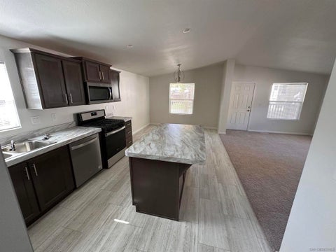 Photo of 22899 Byron Road Rd #110, Crestline, CA 92325 (MLS # 250041191SD)