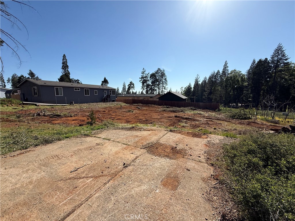 Welcome to 13999 Pineland Circle, a peaceful and inviting lot tucked away on a quiet, tree-lined street in beautiful Magalia. This 0.23-acre parcel offers the perfect opportunity to build your dream home in a serene setting, just minutes from local amenities and a short drive to Paradise. Whether you're looking to settle into a quiet mountain community or invest in the future of the Ridge, this spacious lot provides a wonderful canvas for your vision. With gentle terrain and natural beauty all around, it's easy to imagine a charming home nestled on this street. Take part in the exciting revitalization of this beloved area - 13999 Pineland Circle is ready for your ideas and inspiration. Don't miss your chance to own a piece of the Ridge and be part of its continued growth and renewal.