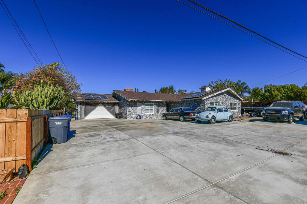Welcome to 13138 Julian Ave, a fully remodeled home in Lakeside! This spacious 4-bedroom, 2-bath home offers 2,184 sq. ft. of beautifully updated living space on a massive lot. With a brand-new A/C system, stunning new bathrooms, and a sleek, modern kitchen, this home has been meticulously upgraded to provide both comfort and style. Enjoy the luxury of a new fireplace, fresh interior and exterior paint, and a newly replastered pool. The property also boasts new plumbing throughout, a convenient outdoor shower by the pool, and new concrete surrounding the home, offering a fresh, clean look. With solar panels, this home is both eco-friendly and energy-efficient. Don't miss the opportunity to own this stunning property that combines modern upgrades with spacious outdoor living.