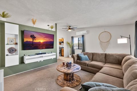 Photo of 5474 Cahuilla Avenue, 29 Palms, CA 92277 (MLS # JT26020928)