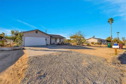 Photo of 5474 Cahuilla Avenue, 29 Palms, CA 92277 (MLS # JT26020928)
