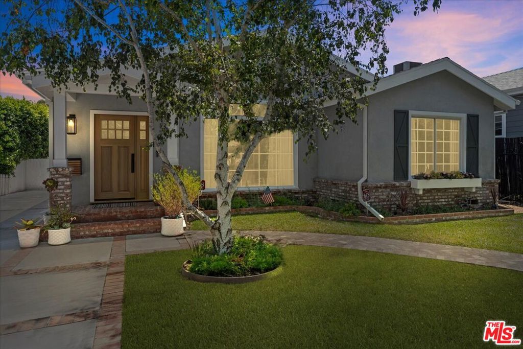 TURNKEY HOME WITH INCOME-GENERATING ADU SOUTH OF THE BLVD! Discover this thoughtfully updated home with detached ADU offering exceptional rental income potential to supplement your mortgage. This unique property in prime Sherman Oaks blends modern comforts with timeless character featuring an entertainer's backyard. The main residence (approx 1800 sq ft) offers 3 spacious bedrooms and 2 bathrooms, highlighted by soaring wood-beam ceilings, designer lighting, and two stunning fireplaces (decorative) anchoring the living and family rooms. Flow effortlessly from an inviting front entry to a sophisticated living/dining area with oversized windows and into a gourmet kitchen featuring quartz countertops and custom cabinetry. The family room, with vaulted ceilings, opens through French doors to a recently redesigned backyard. The primary suite provides peaceful privacy with custom closets, an en suite bath, and its own French doors to the backyard. Two additional bedrooms with custom closets share a large bathroom. Ample storage space is found throughout the home, including a laundry room with a separate entrance. What truly sets this property apart is the fully permitted ADU (approx. 420 sq ft), ideal for guests, home office, studio, or a reliable income-producing rental. Featuring a full kitchen, bathroom, separate address, and step-free access from curb to door, the ADU offers exceptional flexibility and added value. Whether used as a rental unit, guest suite, or workspace, it can help offset your mortgage while providing versatile living options. Recent major property upgrades include a new roof, HVAC system, new and restored hardwood floors, tile flooring, designer light fixtures and ceiling fans, custom window treatments and closets, new fireplace surrounds, fresh paint, new doors and molding throughout, plus much more! In 2025, the entire property was thoughtfully relandscaped, perfect for entertaining or relaxing. Enjoy a custom outdoor kitchen and built-in BBQ area ideal for gatherings and sunset dinners. The grounds feature smart irrigation, citrus trees, and vibrant privacy hedges surrounding the front and backyard. Additional exterior amenities include an automatic driveway gate, privacy fencing, a 220V EV charger, whole-house water filtration system, Leaf Filter gutter guards, and low-maintenance landscaping. There is also plenty of room for a pool! Located on one of the most desirable streets South of Ventura Blvd, you're just steps from fine dining, shopping at The Shops at Sportsmen's Lodge, and within the sought-after Dixie Canyon Elementary School district. This rare, one-of-a-kind property offers a turnkey home, income potential, and an unbeatable location all in one perfect package. Don't miss this incredible opportunity! Listing agent is an owner. Listing Broker and Agent recommend that Buyer and Buyer's Broker and Agent fully investigate all aspects of the property and verify any and all info above.