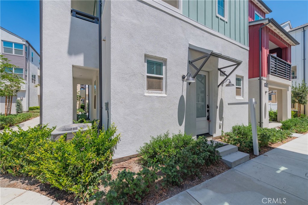 Welcome home to the beautiful gated community of Parkside in the booming area of Ontario Ranch! With the corner lot location it offers abundant natural light and privacy. Enter on the first floor to find a bedroom with a full bathroom and its own private entrance alongside the entrance to an attached 2-car garage. On the second level, you will find an open floor plan with a spacious kitchen featuring a walk-in pantry and a large center island with a single basin sink. The living room is perfect for entertaining and has access to the outside balcony through a sliding door. On the third level, you will find 3 bedrooms and 2 restrooms, including the primary bedroom suite with a walk-in closet. The second bedroom has upgraded cabinetry and custom lighting throughout. All appliances are also included! The community offers many amenities, including gated security, a playground, a dog park, a pool and spa, and even a fitness and business center. Don't miss out on the opportunity to make this home yours today!