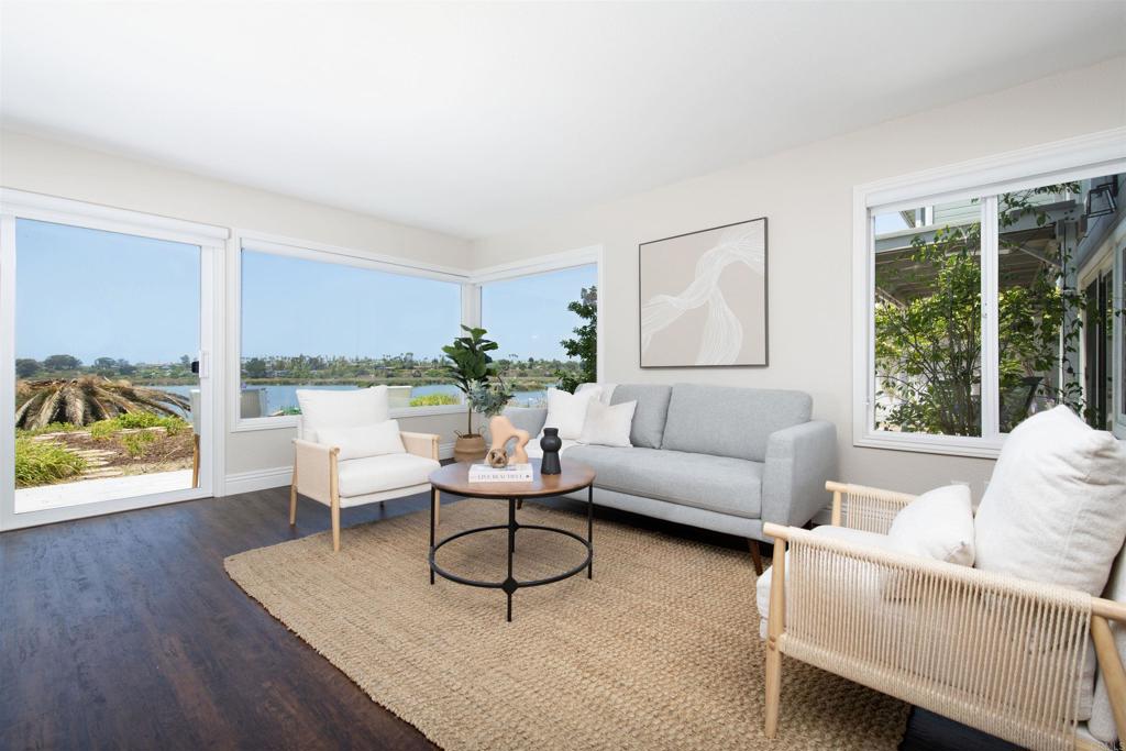Spectacular Lagoon & Ocean Views – Walk to Carlsbad Village! Discover the ultimate coastal lifestyle in this beautifully upgraded 2 bed, 2 bath condo, perfectly situated on the Buena Vista Lagoon with water and ocean horizon views. Wake up to the peaceful shimmer of the lagoon and wind down with breathtaking sunsets from your private lanai—a truly rare opportunity in a prime Carlsbad location. This light-filled home features luxury plank flooring, granite countertops, stainless steel appliances, and designer paint finishes, all thoughtfully curated to reflect modern coastal elegance. Large windows bathe the open floor plan in natural light, creating a warm and inviting atmosphere throughout. Location is everything—and this one can’t be beat. Just a few blocks from the heart of Carlsbad Village, you’ll enjoy walkable access to charming boutiques, award-winning restaurants, weekend farmers markets, cafes, and coastal nightlife. Carlsbad State Beach is only one mile away, so you’re never far from sun, sand, and surf. Conveniently located west of I-5, this condo also offers quick access for commuting while still feeling like a tranquil escape. Whether you're seeking a full-time residence, second home, or coastal investment property, this turn-key gem offers views, lifestyle, and location all in one. Schedule your showing today—this rare opportunity won’t last long!
