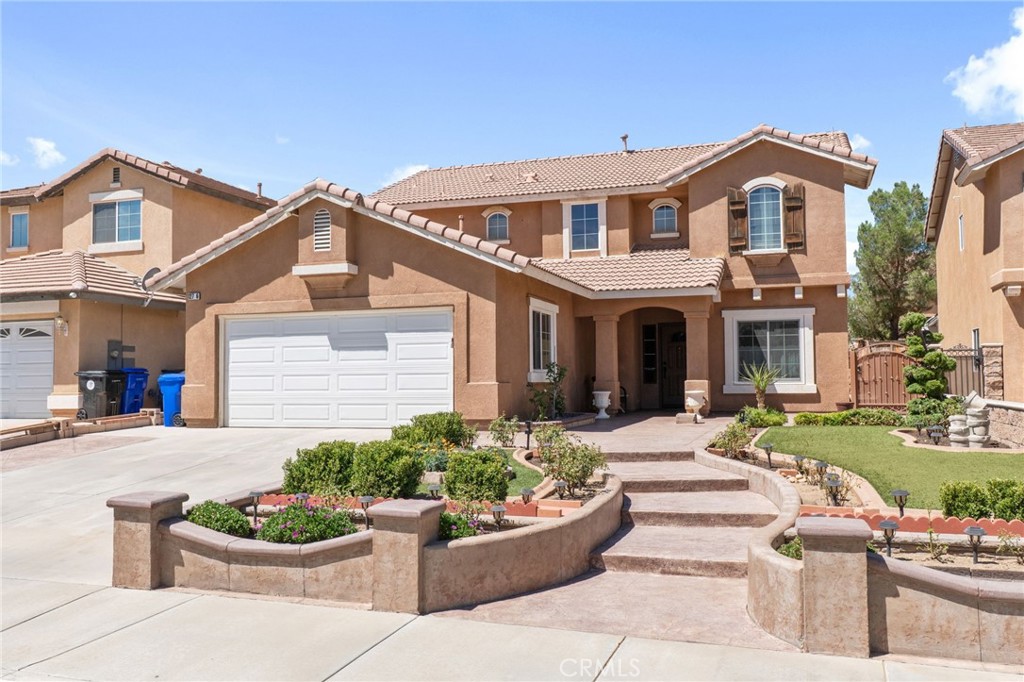 This stunning home offers beautiful curb appeal with a meticulously maintained yard and a welcoming stamped concrete patio and walkway leading to the entry. Step inside to find a welcoming family room with a cozy fireplace and sliding doors that open to the backyard. The spacious dining area flows seamlessly into the kitchen through two charming arched entries. The kitchen features granite countertops, a tile backsplash, and plenty of cabinetry for storage.
The main floor offers versatility with an office featuring laminate flooring—ideal for working from home—or it can be used as an additional bedroom. A full bathroom and a second bedroom with a ceiling fan are also conveniently located downstairs. Tile flooring runs throughout the first level, with a small carpeted area for added comfort.
Upstairs, you’ll find a generous loft, a spacious primary suite with a dual-sink vanity, granite counters, a soaking tub, and separate his-and-hers closets. Three more spacious bedrooms, a full bathroom, and an upstairs laundry room complete the second floor.
The backyard is perfect for entertaining with a charming gazebo, a cemented patio area, and a decorative retaining wall. Just last year, the gazebo was installed in the back yard, a new front door and windows, new water heater, dishwasher and garbage disposal were all installed, to be enjoyed by it's next set of homeowners.
Located close to Highway 395, this home blends style, comfort, and convenience in one perfect package.