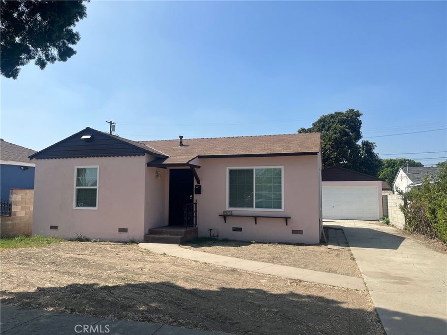 This 2 Bedroom is located in a great neighborhood close to schools and shopping.  The kitchen has new lower cabinets with a new countertop and a new sink.  The bath has been completely updated with a new tub and vanity.  New tile surrounds the tub. New Vinyl plank floor throughout.   New energy efficient windows throughout the house.  New paint inside and out.  New water heater.  New roof over the garage.  Detached Double car garage.  Large lot waiting for expansion or an ADU.