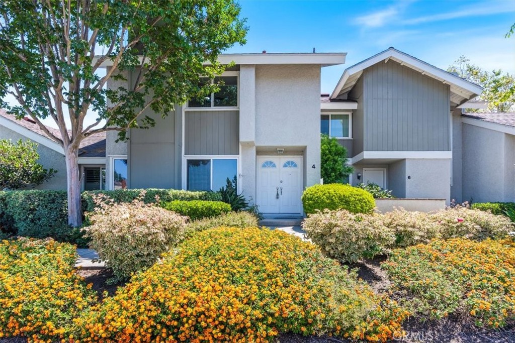 Meticulously upgraded home, offering 3 bedrooms and 2.5 baths in the highly sought after Deerfield Neighborhood. Every detail has been thoughtfully crafted, from new High-End Laminate Flooring to custom Kitchen Cabinetry with new Appliances, new Carpet, new Ceiling Fans, Chandeliers and Light Switches throughout, new Toilets, Vanities and new Bathroom Fixtures in each bathroom, new Door Fixtures, fresh Paint, and new Epoxy garage floors.
Home is bathed in natural light, thanks to high ceilings that create a bright and airy ambiance. The living room is centered around a welcoming fireplace and just beyond, a separate dining area, adorned with a new Chandelier, perfect for family gatherings. The kitchen is a true delight, featuring a trey ceiling, new white custom Cabinets, and elegant Quartz countertops. Enjoy preparing meals while overlooking the private patio, with the added convenience of direct access to the oversized two-car garage with new Epoxy floors and plenty of storage. Upstairs the primary suite features an expansive wall-to-wall closet and an en suite bathroom complete with a custom vanity, new fixtures, and updated shower. Across the hall are two equally bright and inviting bedrooms with a shared bathroom complete with new vanity and fixtures. Quiet premium unit is centrally located near everything you need—Parks, Restaurants, Supermarkets, and Shopping. Located within the award-winning Irvine School District, it's just a short walk to Deerfield Elementary School. Enjoy easy access to the 5 and 405 freeways, the Airport, World-Class Shopping Centers, iconic OC Beaches, and top-tier Parks, Entertainment and Sports venues.