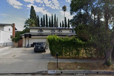 Photo of 13126 Courbet LN, Los Angeles, CA 91344 (MLS # GD26165760)