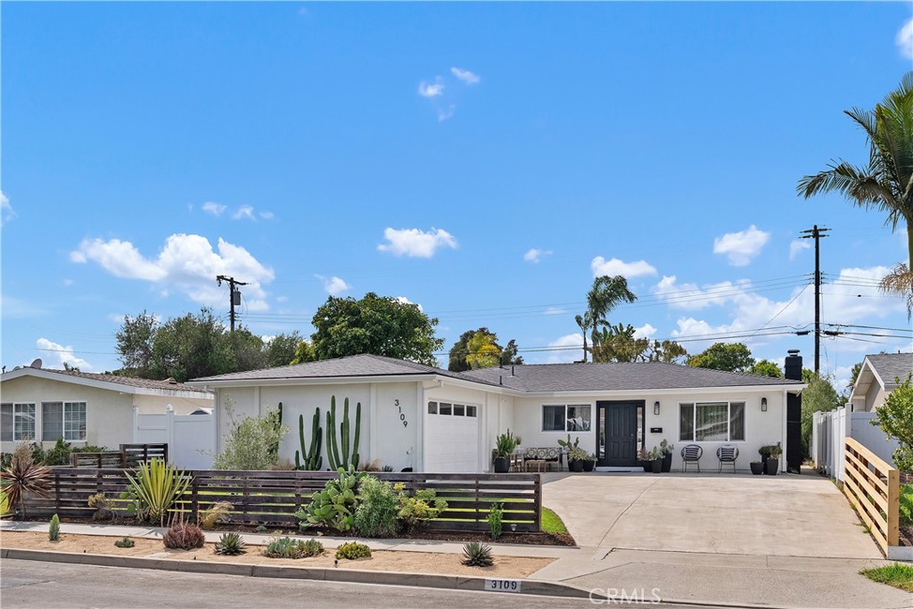 Move-in ready and fully renovated, 3109 Barbados Place offers modern coastal living with timeless design in the highly sought-after Mesa Verde neighborhood of Costa Mesa. This beautifully updated single-story home sits on a quiet interior street and features 4 spacious bedrooms, 2 fully remodeled bathrooms, and approximately 1,703 square feet of bright, open living space thoughtfully designed for both entertaining and everyday comfort.
Step inside to discover a light-filled floor plan with contemporary flooring throughout. The updated kitchen boasts quartz countertops, stainless steel appliances—including dishwasher, oven and microwave —custom soft-close cabinetry, and flows effortlessly into the adjacent family room. An updated fireplace adds warmth and character, making it the perfect space for gatherings or relaxed evenings at home.
The primary suite features custom barn doors, a generous walk-in closet, and a spa-inspired en suite bathroom designed as a serene escape. The secondary bathroom is equally impressive with sleek, modern finishes. Additional highlights include a dedicated laundry room with a utility sink, the washer and dryer are included in the sale, epoxy-coated garage floor, a 2-car attached garage with a large driveway offering ample parking, and major upgrades such as a brand new roof with a solar attic fan, new gutters, energy-efficient windows, fresh interior and exterior paint, and a newly installed EV charger.
Set on a generous 6,000-square-foot lot, the property balances low-maintenance drought-resistant landscaping with excellent outdoor potential, ideal for entertaining or enjoying sunny California days. Located just minutes from Fairview Park, Mesa Verde Country Club, top-rated schools, shopping, dining and some of Southern California’s best beaches, this is a rare opportunity to own an exceptional home in one of Costa Mesa’s most desirable neighborhoods.
This turnkey residence combines style, comfort, and convenience—ready for you to move in and enjoy the best of coastal living.
