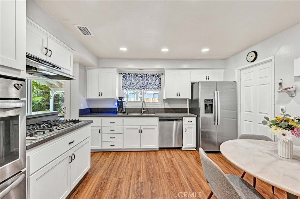 Welcome to this charming Brea home, perfectly situated in a quiet, well-established neighborhood. This 5 bedroom home has 2.5 baths and 1,781 SqFt of living space. With thoughtful updates and a spacious layout, this residence is designed for everyday comfort and effortless entertaining. Step into the spacious living room, where fresh interior paint and a cozy fireplace create a warm and welcoming atmosphere. Just around the corner, the beautifully updated kitchen features white shaker cabinets, sleek quartz countertops, and lots a space for storage. Dine in the separate dining room that overlooks the covered patio and backyard space. Upstairs, you’ll find 5 generously sized bedrooms (Currently 4 bedrooms- Could reinstall the wall to convert back to a 5th bedroom), offering flexible space for family, guests, or a dedicated home office. Each room is filled with natural light, creating a sense of comfort and retreat throughout the upper level. Out back, enjoy your own private oasis. A sparkling pool, spacious covered patio, and the bonus of no direct neighbors behind make it the ideal space for hosting, relaxing, or simply enjoying the quiet surroundings. With its fresh updates, functional floor plan, and inviting backyard, this home is a wonderful opportunity to settle into one of Brea’s most desirable neighborhoods. This home is perfectly located near dining, schools, shopping, freeways and more! Come see this home today!