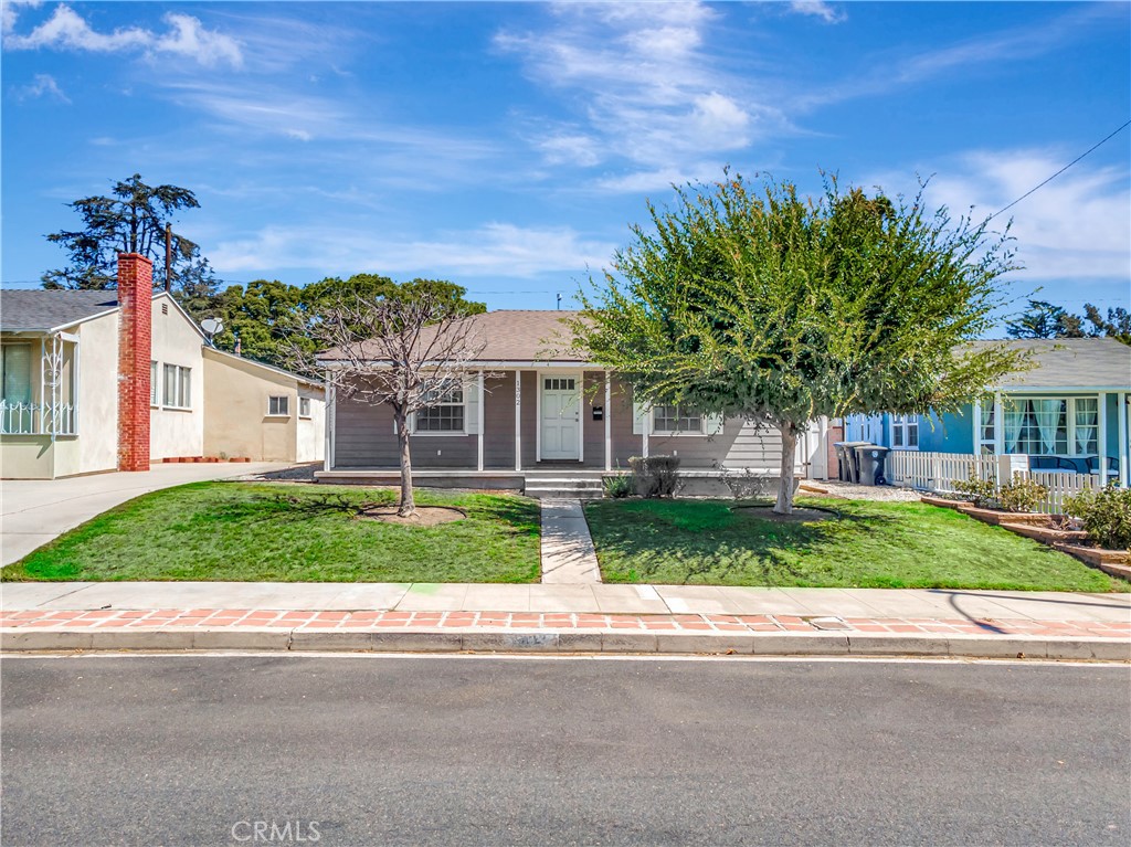 Discover this delightful 2-bedroom, 1-bathroom single-family gem in Burbank! Impeccably maintained, it boasts a spacious living room with hardwood floors and stylish recessed lighting. Flow seamlessly into the chef-inspired kitchen, complete with bespoke cabinets, elegant Caesarstone countertops, and a convenient breakfast bar. Step into the generous primary bedroom, flooded with sunlight and offering easy backyard access. The cozy outdoor space is ideal for gatherings, featuring a shaded patio and lawn. Plus, the spacious detached garage includes laundry area, ample overhead storage, and potential for conversion into your dream ADU. Upgrades abound with a newer HVAC system, newer water heater, newer electical panel, and newer dishwasher. Nestled right across from Whitnall Highway Park, near shopping, eateries, and with quick access to the 5 and 134 freeways-this property is an absolute must-view!