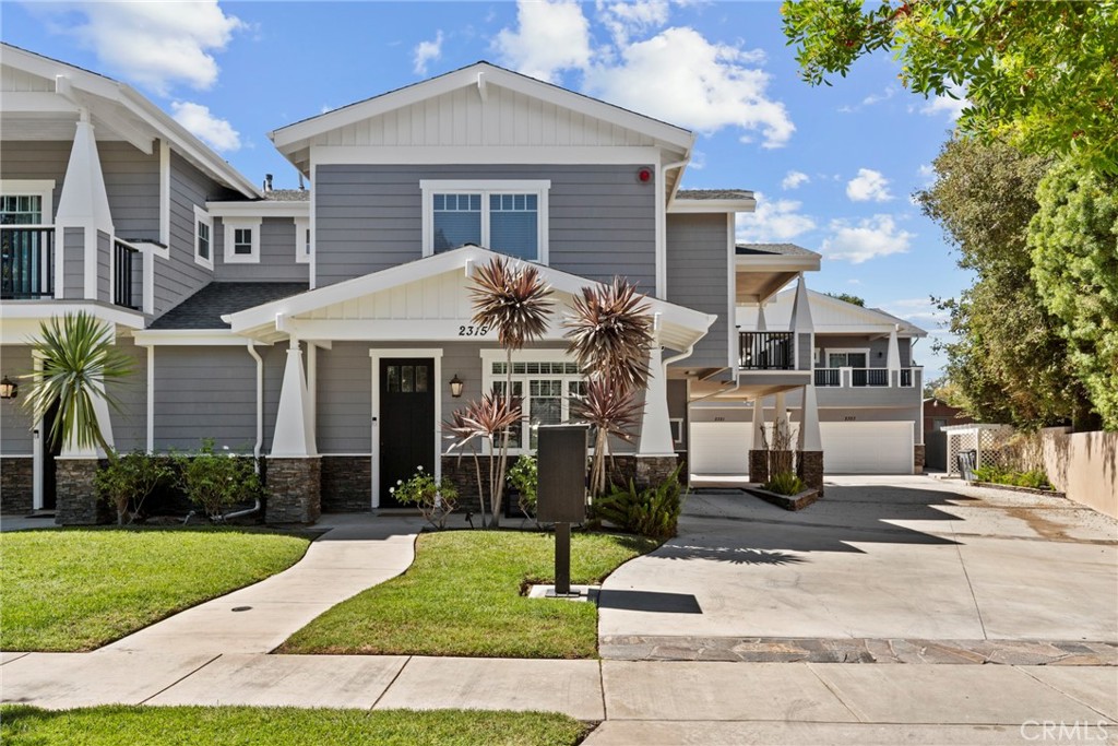 Welcome to this immaculate, light-filled Craftsman townhome, perfectly situated on a quiet cul-de-sac. Built in 2013, this home lives like a single-family residence, sharing only one wall for maximum privacy. Step inside to an inviting open-concept layout with beautiful engineered wood floors throughout. The remodeled kitchen features quartz countertops, stainless steel appliances and modern fixtures. It flows seamlessly into the dining area and a spacious great room to create a wonderful environment to relax. A convenient powder room, smart storage under the stairs and direct access to the two-car garage complete the main level. Upstairs, you'll find three spacious bedrooms, all with vaulted ceilings, recessed lighting and ceiling fans. The oversized primary suite is a true retreat, boasting a luxurious updated en-suite bathroom with dual sinks, a walk-in closet, and a private wrap-around balcony. The upstairs laundry room add to the home's thoughtful design and convenience. You’ll also enjoy the additional comfort of the newer Central AC system with smart thermostat and a new water heater. Living here means enjoying the benefits of the highly-rated school district, with Torrance Elementary, Hull Middle, and Torrance High all nearby. You're also just a short stroll from Wilson Park, with its wonderful Farmer’s Market twice a week, plus great shopping and dining options in Old Town Torrance. With low HOA fees of just $200 a month, this is a rare opportunity to own a modern home in a prime location.