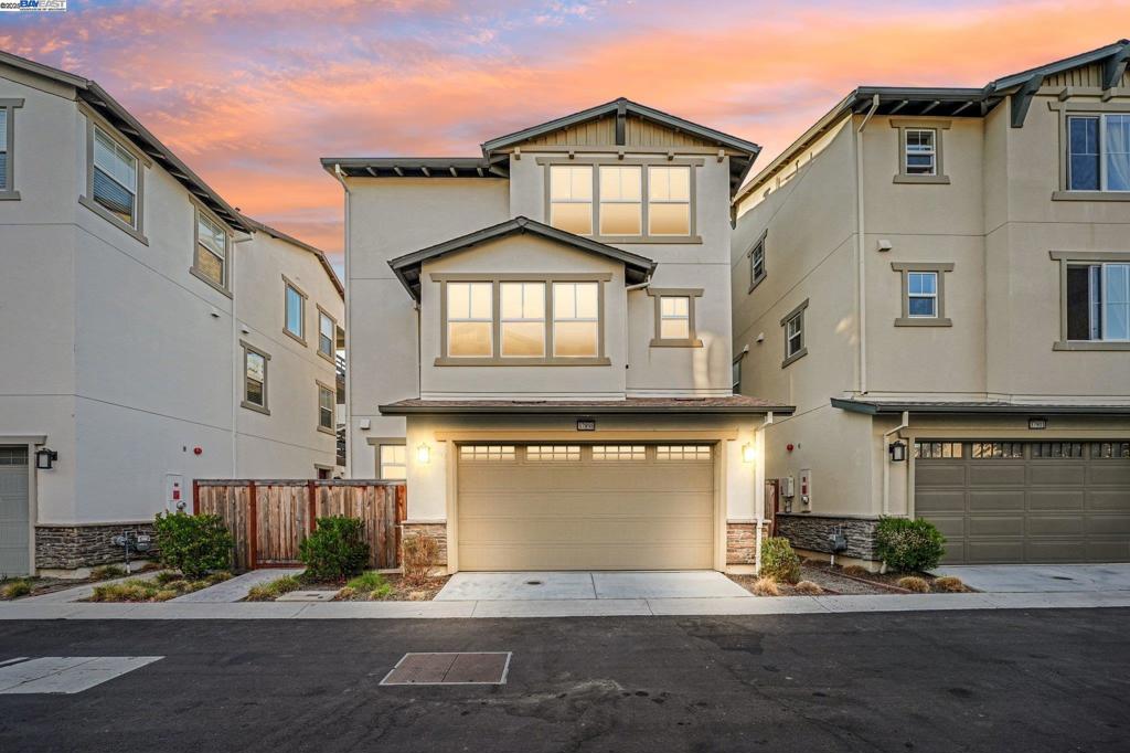 Welcome home to this luxurious, fully upgraded north-facing 5BR/4.5BA in the sought-after Bridgeway Community. This modern, energy-efficient smart home features fully owned solar panels, EV charging, tankless water heater, and high-end finishes throughout. The open-concept kitchen, dining, and living area is ideal for entertaining, with quartz countertops, stainless steel appliances, shaker cabinets, and tile backsplash. Enjoy outdoor living with a paved patio and spacious California Rooms on the 2nd and 3rd floors offering fresh breezes and scenic views. The elegant owner’s suite includes a large soaking tub and generous closet space. A 2-car garage adds convenience. Resort-style amenities include a clubhouse, sparkling pool, jacuzzi, full kitchen, lounge, walking trails, and sunset views. Ideally located near HWY 880/84, Tesla, Meta, Dumbarton Bridge, Ranch 99, Sprouts, and more. Walking distance to Meta shuttle. A rare blend of luxury, comfort, and prime location—this turnkey gem has it all!